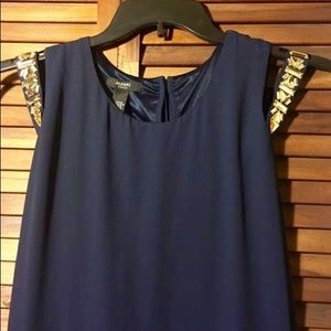 Plus size cold shoulder dress.